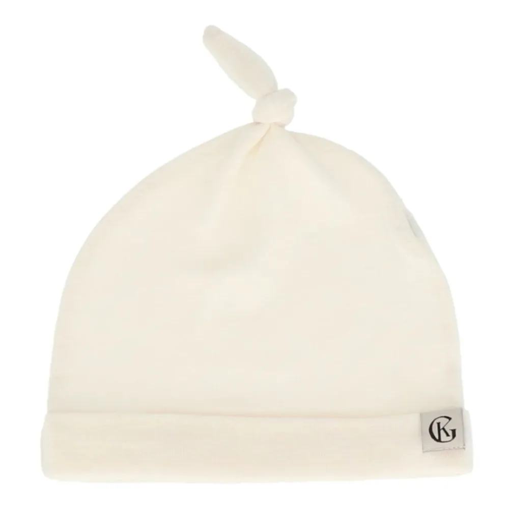 Gullkorn Vakke Ull-lue, Design, Varm Hvit Hot